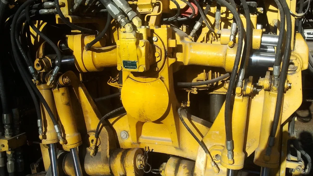 Battery-powered digital drip timer attached to a hose bib near a wellhead
