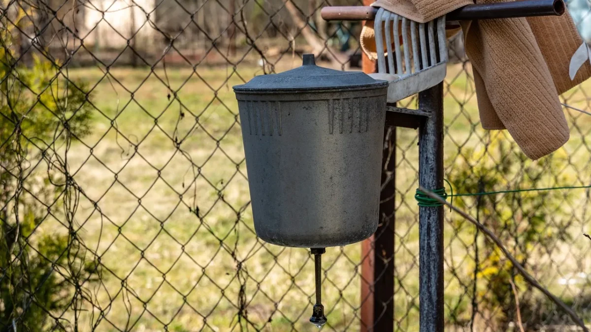 Well pressure tank and gauge in a utility area showing working pressure